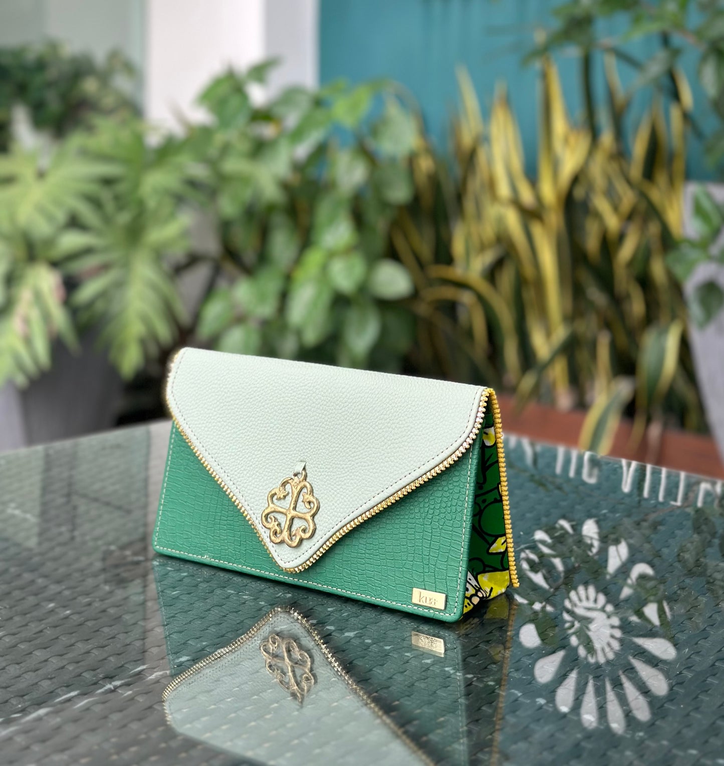 Sika Pomaa Medium Clutch Bag